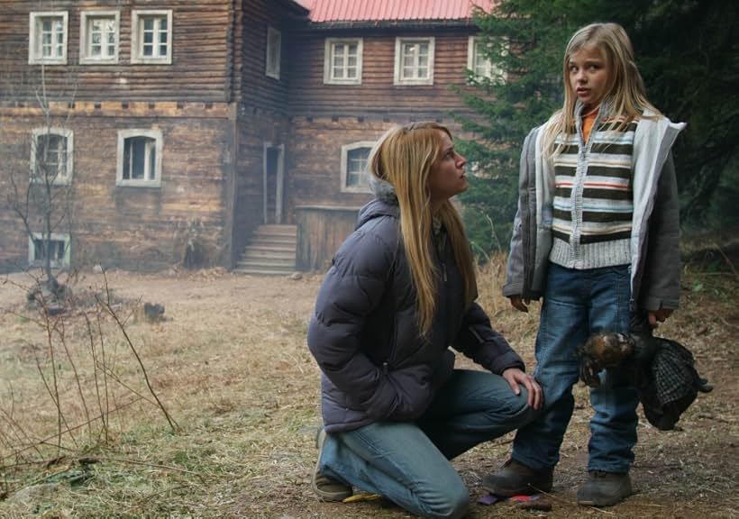 Lori Heuring and Chloë Grace Moretz in Wicked Little Things (2006)