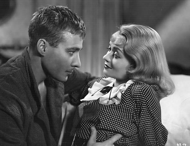 Constance Bennett and Douglass Montgomery in Everything Is Thunder (1936)