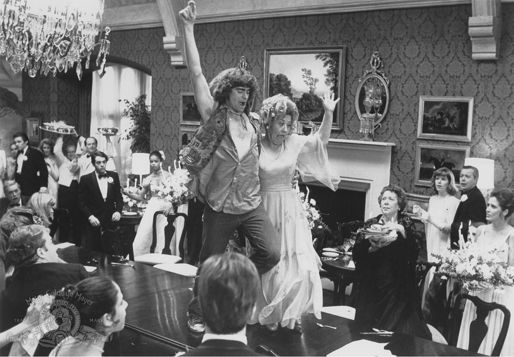 Treat Williams and Charlotte Rae in Hair (1979)