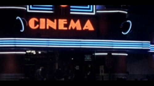 At a crowded movie theater, a group of friends discover a couple on a date.  They decide to do something about it.