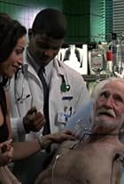 Sharif Atkins, Patrick Cranshaw, and Sofia Milos in ER (1994)