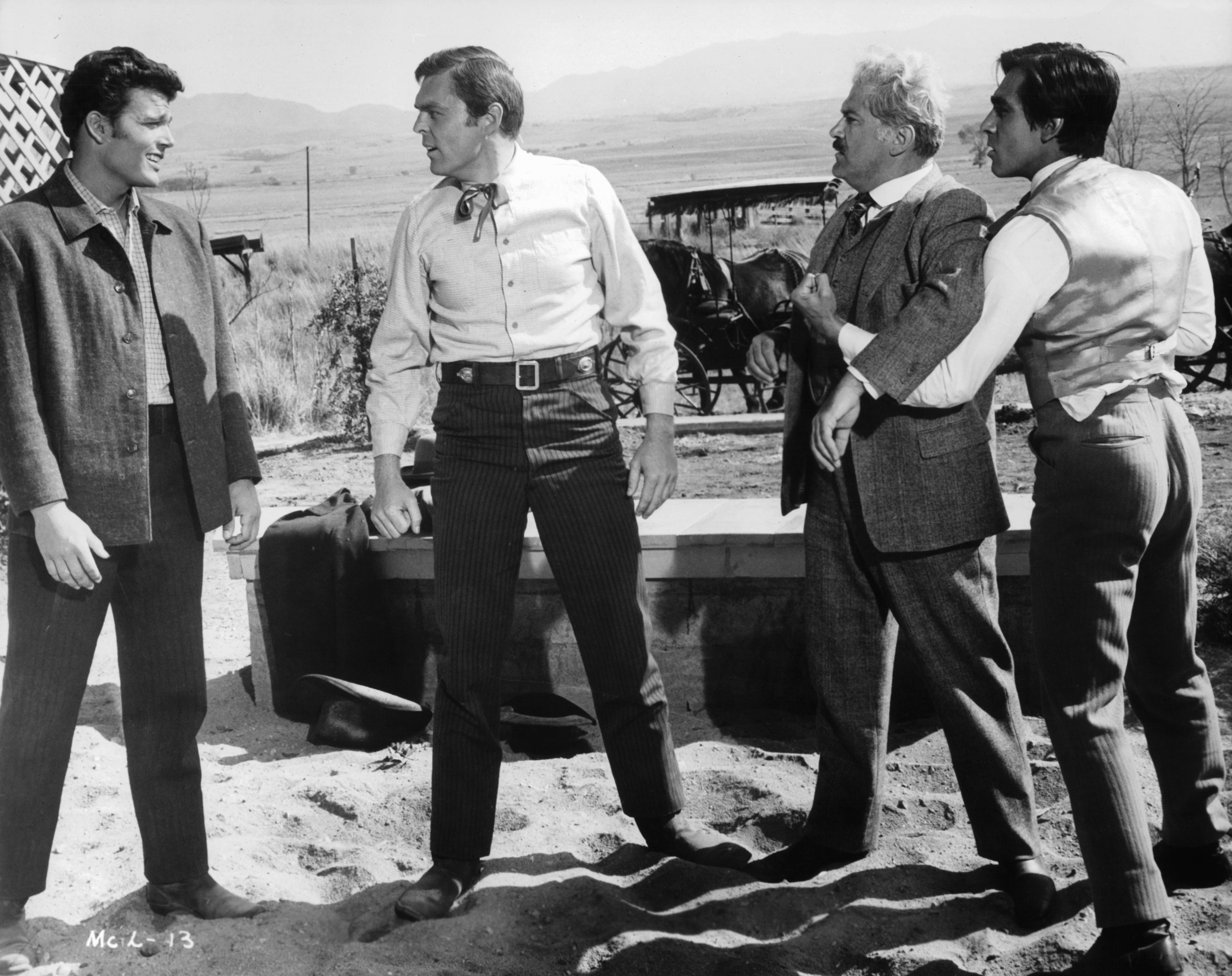 Edward Faulkner, Jack Kruschen, Perry Lopez, and Patrick Wayne in McLintock! (1963)