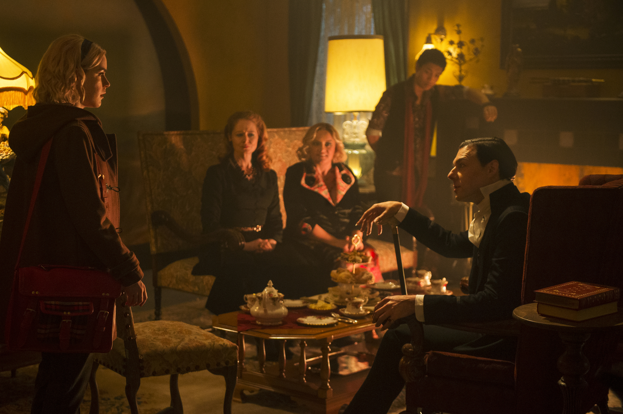 Miranda Otto, Richard Coyle, Lucy Davis, Kiernan Shipka, and Chance Perdomo in Chilling Adventures of Sabrina (2018)