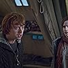 Rupert Grint and Emma Watson in Harry Potter and the Deathly Hallows - Part 1 (2010)