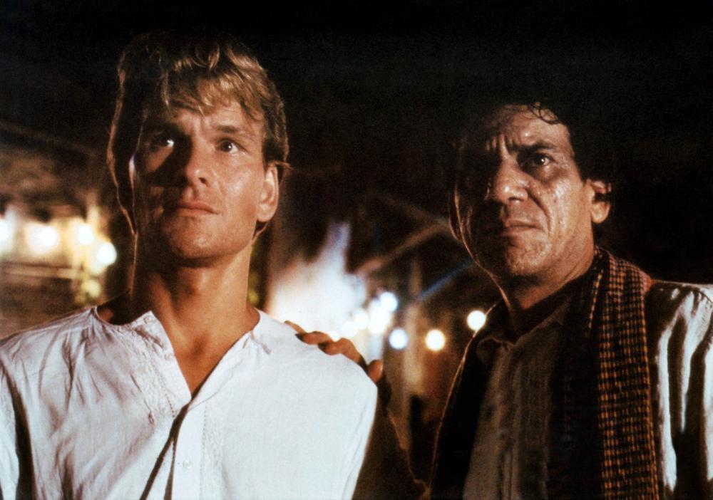 Patrick Swayze and Om Puri in City of Joy (1992)