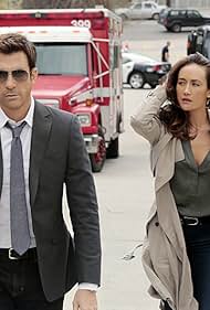 Dylan McDermott and Maggie Q in Stalker (2014)