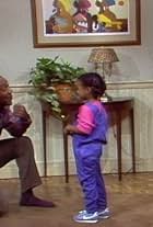 Bill Cosby, Tempestt Bledsoe, and Keshia Knight Pulliam in The Cosby Show (1984)