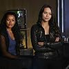 Melissa O'Neil and Melanie Liburd in Dark Matter (2015)