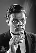 Neville Brand in El cuarto hombre (1952)