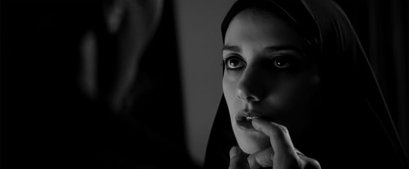 Dominic Rains and Sheila Vand in A Girl Walks Home Alone at Night (2014)