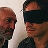 Kim Bodnia and Gael García Bernal in Rosewater (2014)