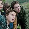 Callan McAuliffe, Ella Hunt, James Tarpey, and Milo Parker in Robot Overlords (2014)