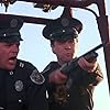 G.W. Bailey and Lance Kinsey in Police Academy 4: Citizens on Patrol (1987)