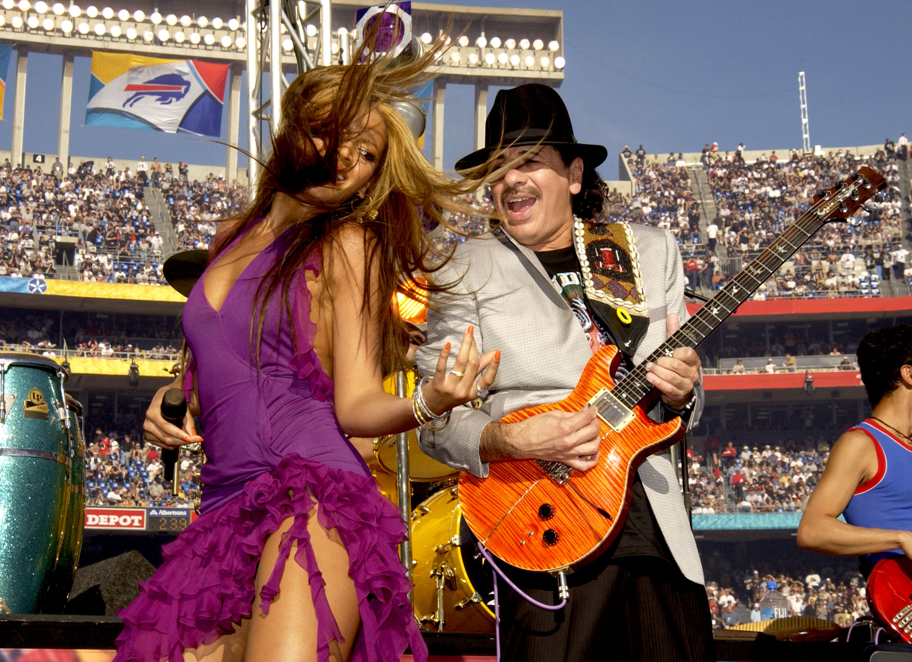 Carlos Santana and Beyoncé at an event for Super Bowl XXXVII (2003)