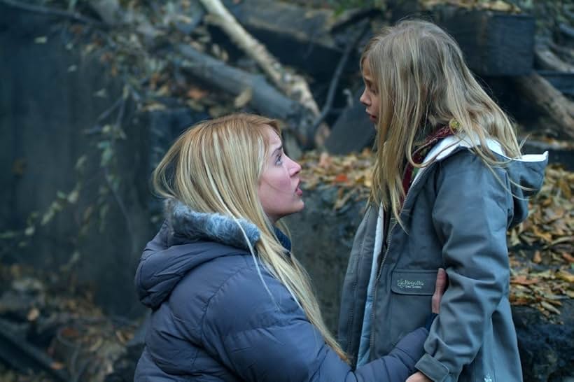 Lori Heuring and Chloë Grace Moretz in Wicked Little Things (2006)