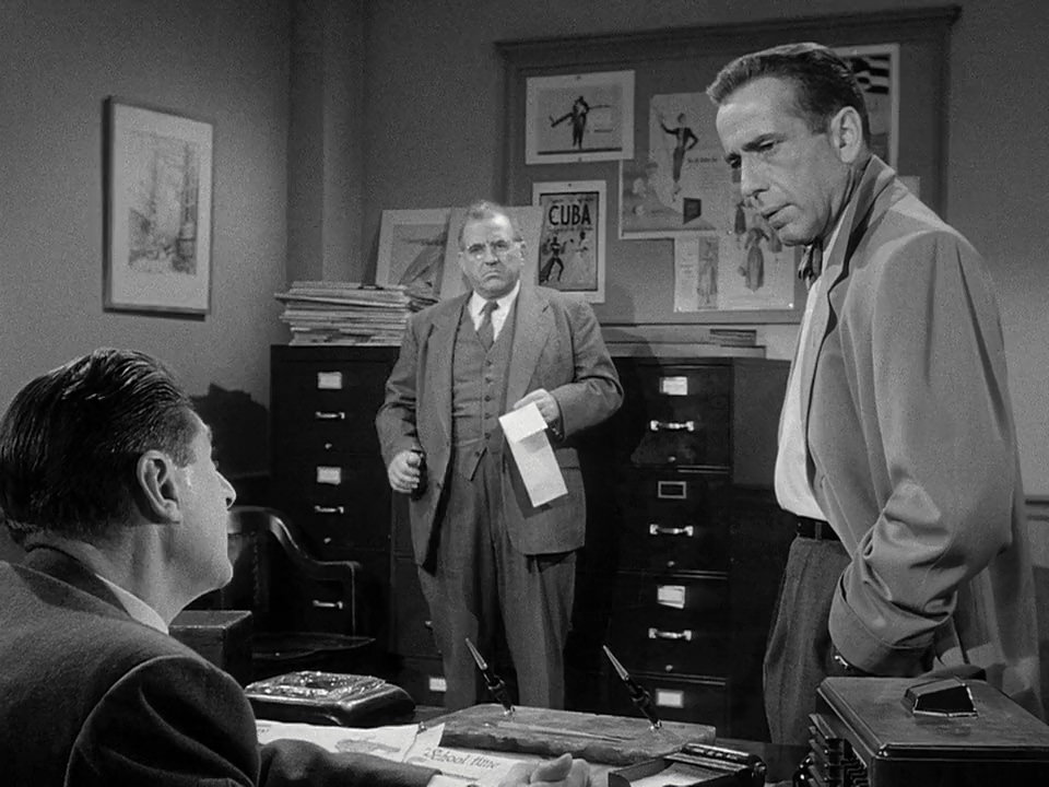 Humphrey Bogart, Ed Begley, and Thomas Browne Henry in Deadline - U.S.A. (1952)