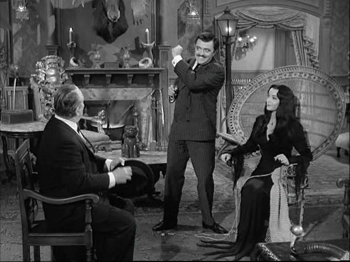 John Astin, Carolyn Jones, and Roy Roberts in The Addams Family (1964)