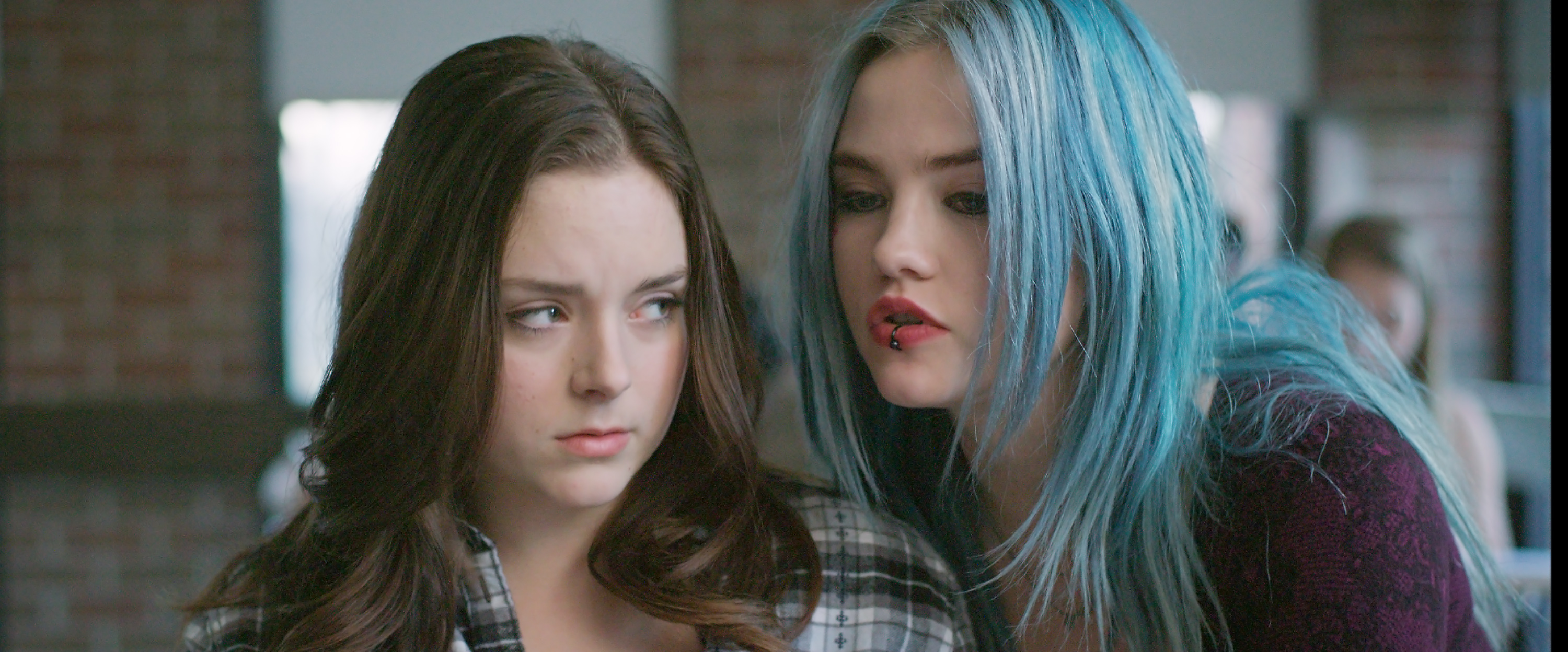 Madison Davenport and Maddie Hasson in A Light Beneath Their Feet (2015)