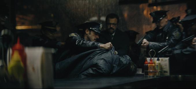 Still of Paul Dano, Jeffrey Wright, and Gil Perez-Abraham in The Batman