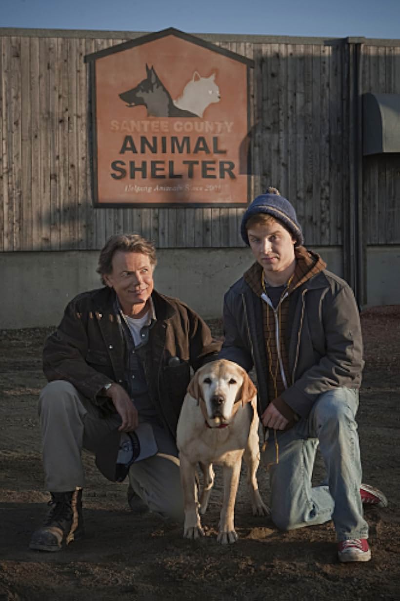 Noel Fisher and Bruce Greenwood in A Dog Named Christmas (2009)