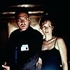 Penelope Ann Miller and Tom Sizemore in The Relic (1997)