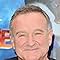 Robin Williams at an event for Happy Feet 2 (2011)