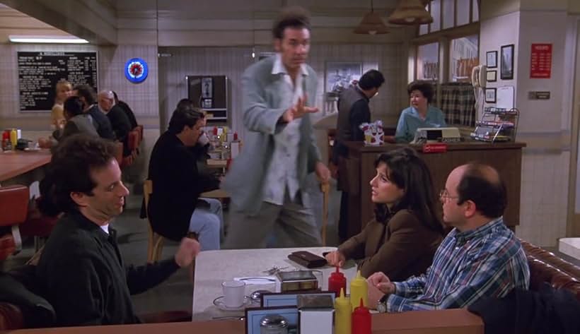 Julia Louis-Dreyfus, Jerry Seinfeld, Jason Alexander, Michael Richards, and Ruth Cohen in Seinfeld (1989)