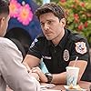 Ronen Rubinstein and Rafael L. Silva in 9-1-1: Lone Star (2020)