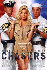 Erika Eleniak, Tom Berenger, and William McNamara in Chasers (1994)