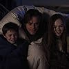 Jim Carrey, Madeline Carroll, and Maxwell Perry Cotton in Mr. Popper's Penguins (2011)