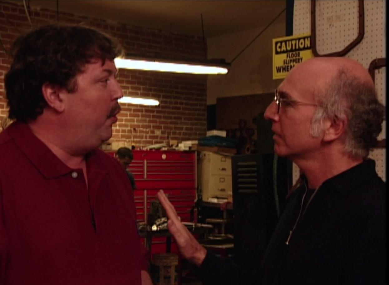 Mike Hagerty and Larry David in Curb Your Enthusiasm (2000)