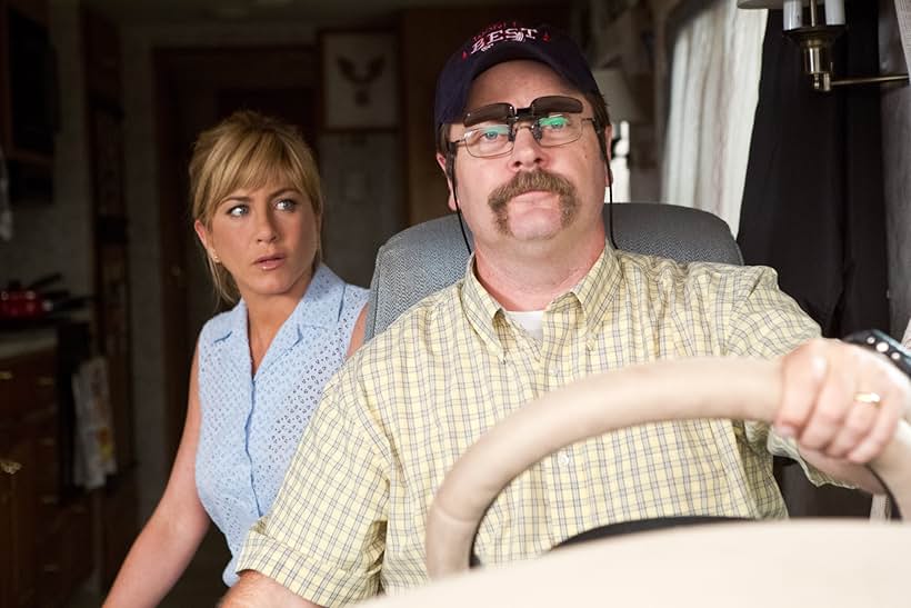 Jennifer Aniston and Nick Offerman in We're the Millers (2013)