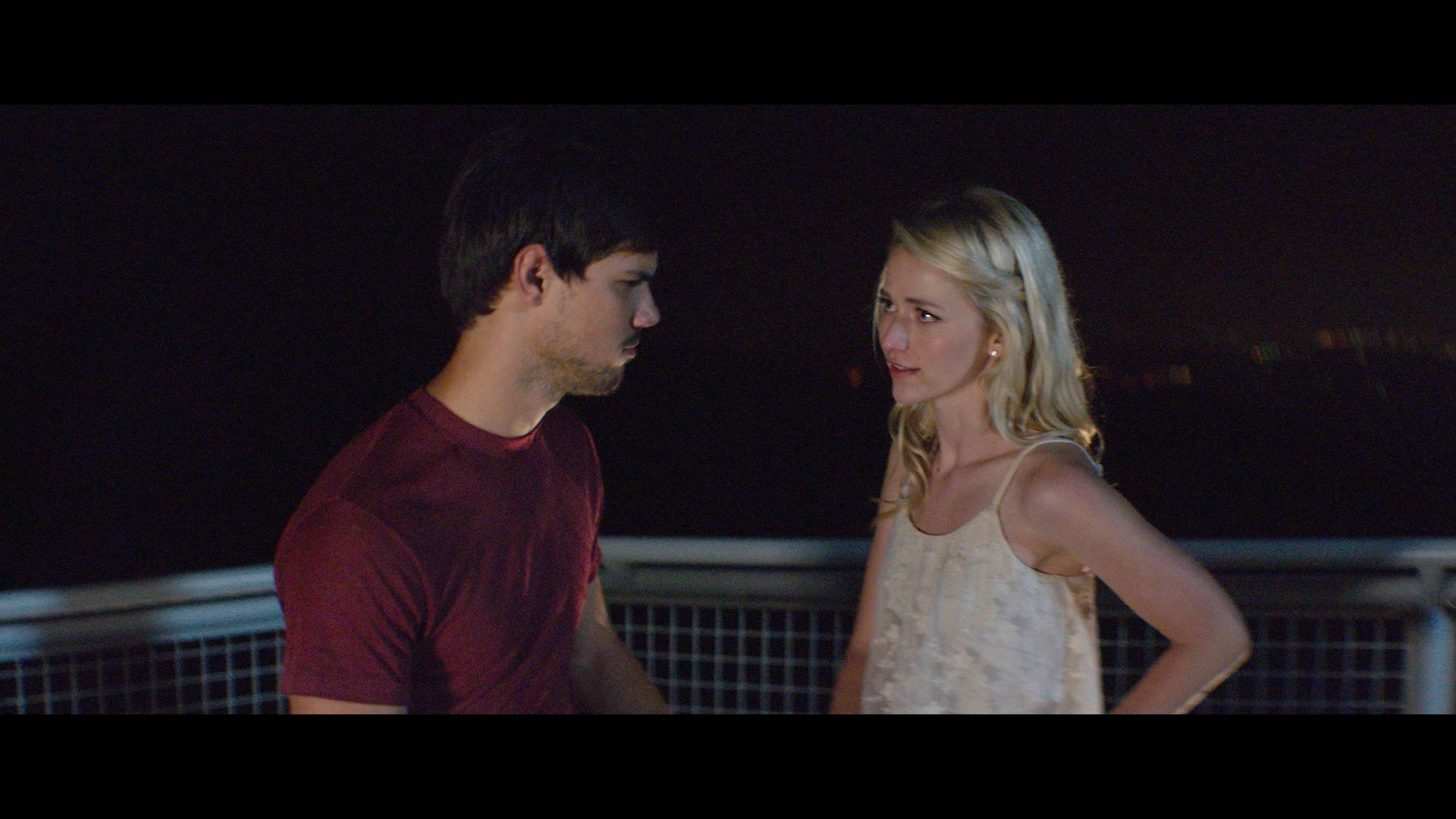 Taylor Lautner and Johanna Braddy in Run the Tide (2016)