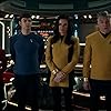 Rebecca Romijn, Anson Mount, Ethan Peck, Christina Chong, Melissa Navia, and Jack Quaid in Star Trek: Strange New Worlds (2022)