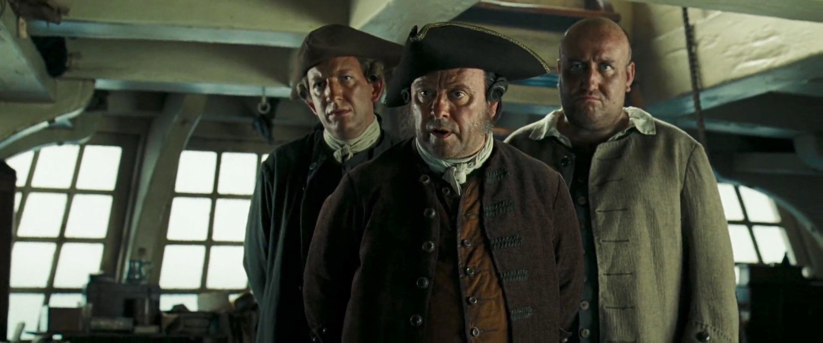 Max Baker, Alex Norton, and Steve Speirs in Pirates of the Caribbean: Dead Man's Chest (2006)