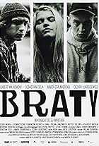 Sebastian Dela, Marta Stalmierska, and Hubert Milkowski in Braty (2022)