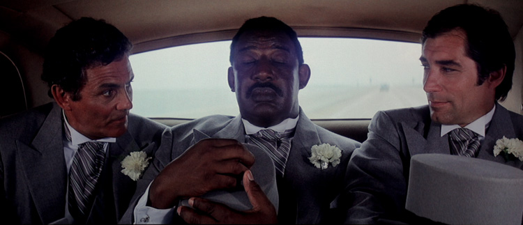 Timothy Dalton, David Hedison, and Frank McRae in Licence to Kill (1989)