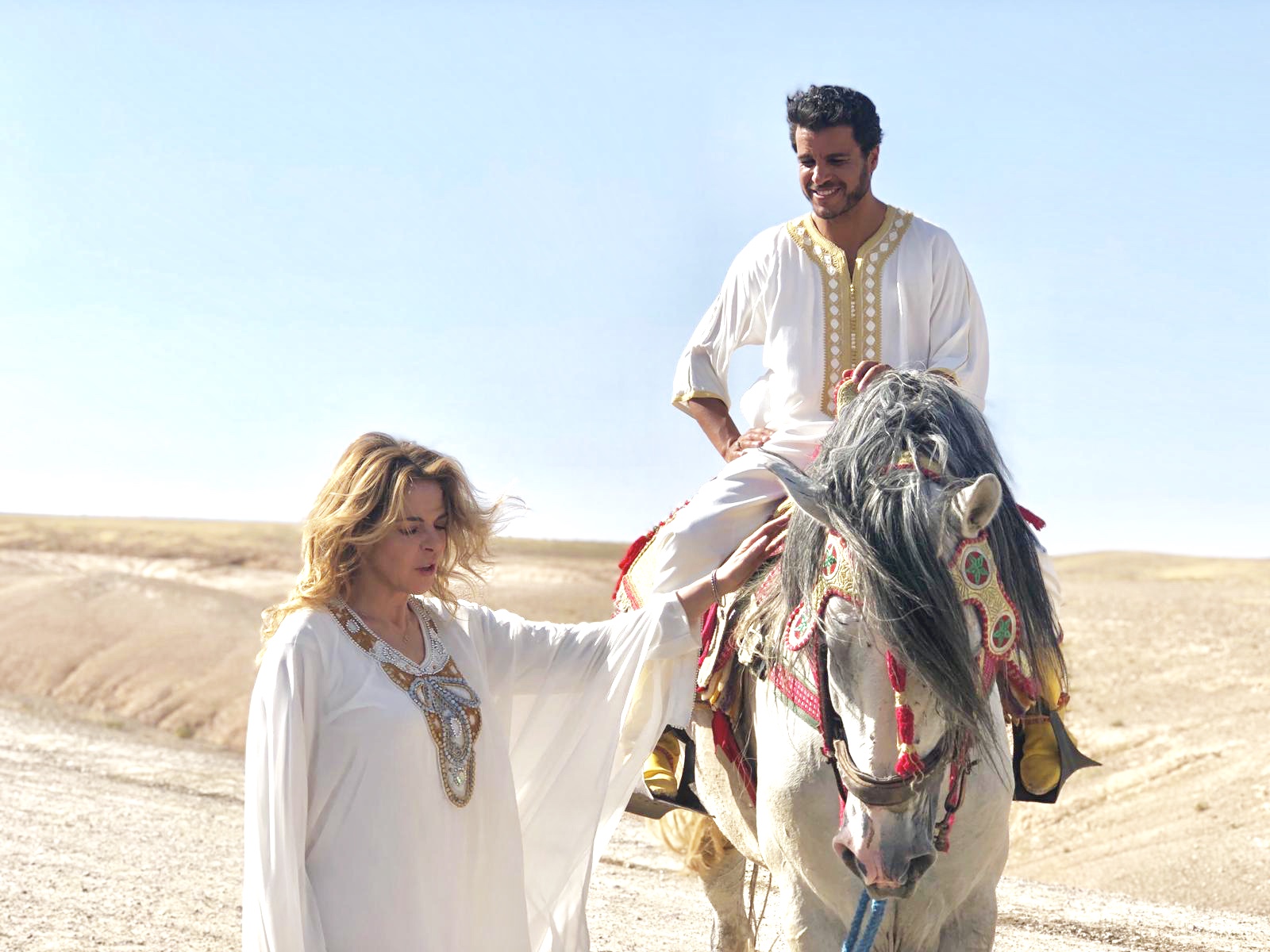 Claudia Gerini and Mohamed Zouaoui in Burraco fatale (2020)