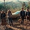 Betsy Baker, Bruce Campbell, Ellen Sandweiss, and Theresa Tilly in The Evil Dead (1981)