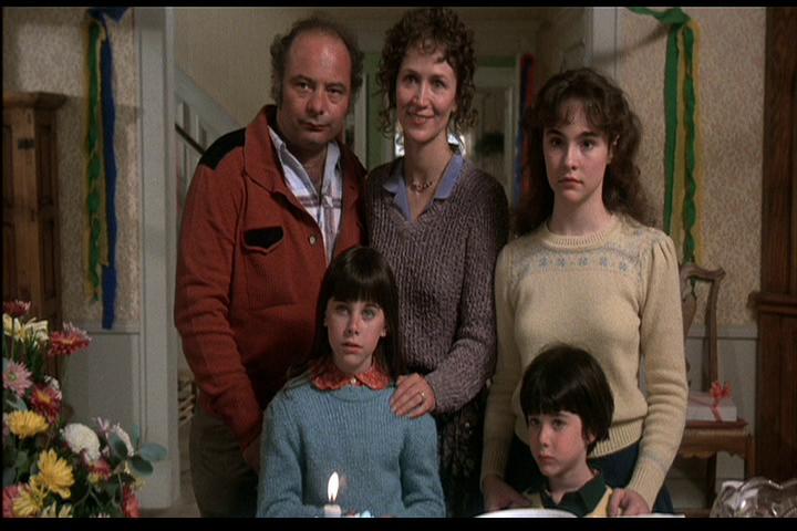 Rutanya Alda, Diane Franklin, Brent Katz, Erika Katz, and Burt Young in Amityville Possession (1982)