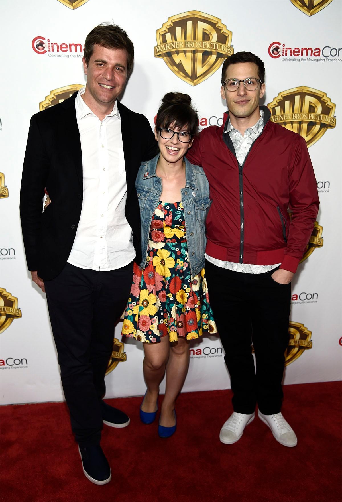 Nicholas Stoller, from left, Katie Crown and Andy Samberg arrive at the Warner Bros. presentation at CinemaCon 2016, the official convention of the National Association of Theatre Owners (NATO), at Caesars Palace on Tuesday, April 12, 2016, in Las Vegas. 