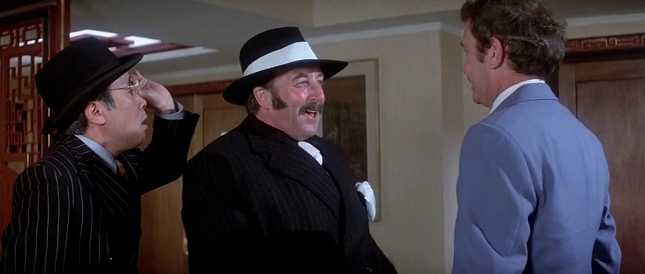 Peter Sellers, Tony Beckley, and Burt Kwouk in La venganza de la pantera rosa (1978)