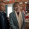 Robin Dunne and Erica Durance in The Enchanted Christmas Cake (2021)