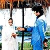 Amitabh Bachchan and Jaya Bachchan in Sholay (1975)