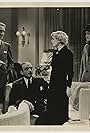 C. Henry Gordon, Isabel Jewell, Roscoe Karns, and Otto Kruger in The Women in His Life (1933)