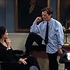 Michael J. Fox and Carla Gugino in Spin City (1996)