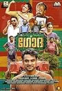 Mammukoya, Renji Panicker, Bijukuttan, Sreejith Ravi, Dinesh Prabhakar, Shine Tom Chacko, Wamiqa Gabbi, Aju Varghese, Dharmajan Bolgatty, Tovino Thomas, Maala Parvathi, Harisree Martin, Pradeep Kottayam, Hareesh Kanaran, Basil Joseph, and Binu Adimali in Godha (2017)