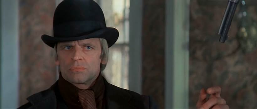 Klaus Kinski in A Genius, Two Partners and a Dupe (1975)