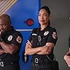 Gina Torres, Brian Michael Smith, and Brianna Baker in 9-1-1: Lone Star (2020)