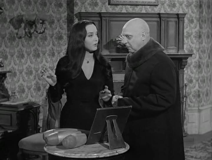 Jackie Coogan and Carolyn Jones in The Addams Family (1964)